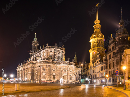 Catholic Court Church (Katholische Hofkirche) in the center of old town in Dresden in evening on lamps light. Germany, Europe