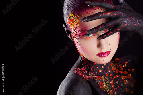 Fotografie Young attractive girl in bright art-makeup, body painting