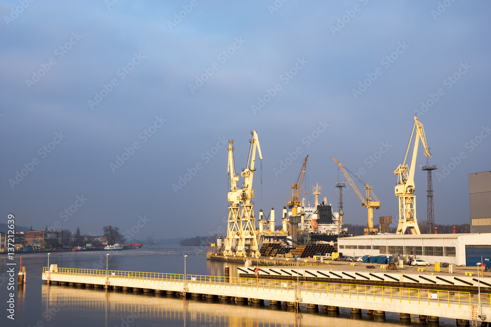 Fototapeta premium Szczecin,Poland-January 2017:unloading a container ship in the sea port