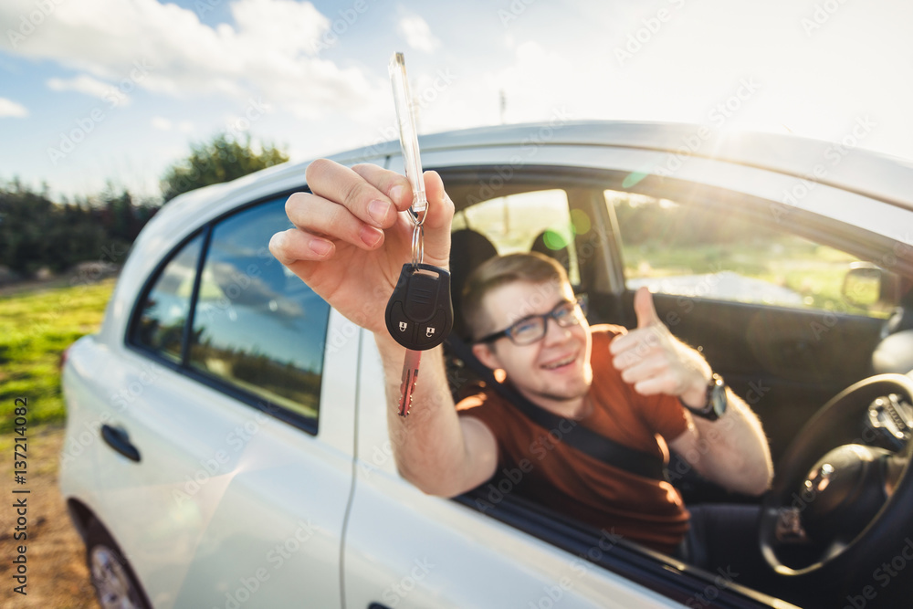 Naklejka premium Happy customer just bought a car at car dealership