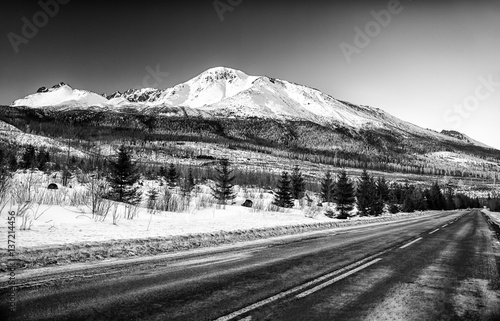 Asphalt road and mountains
