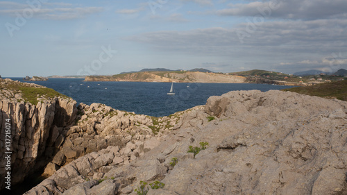 Coast landscapes. On a road with a camper van in the great north of spain. From Bilbao to Santander and further along the coast in the west. Landscapes, nature and surfing captures. photo