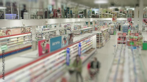 People are buying food in a supermarket