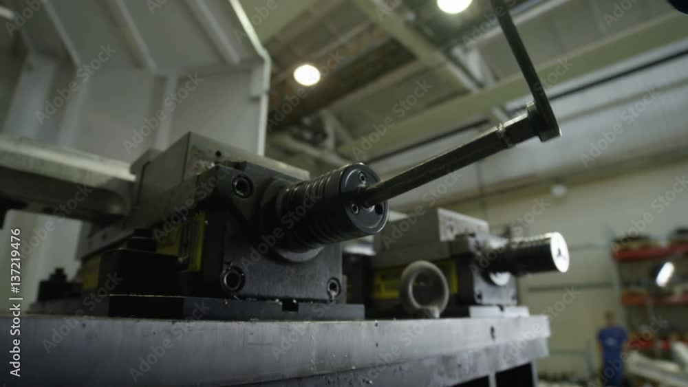 Closeup Worker Turns Around Machine-tool Handle Closeup Worker Turns Around Machine-tool Handle