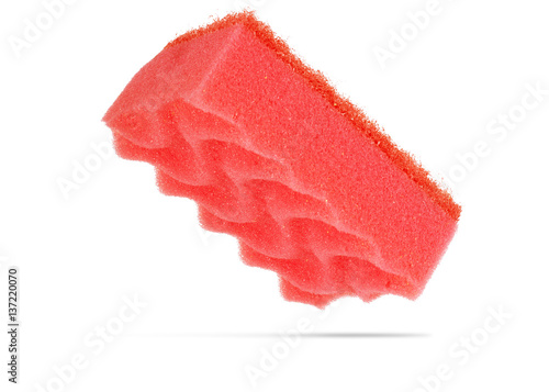 Simple old red sponge isolated on white