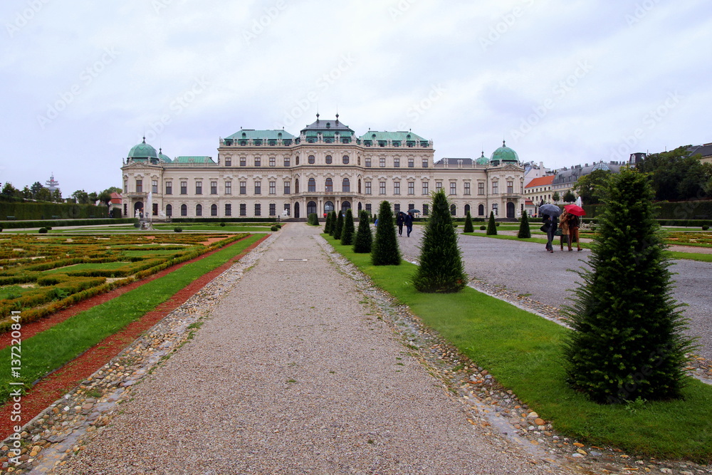 Travel to Vienna, Austria. The view on the Belvedere Palace and park in front of him in the rainy day.