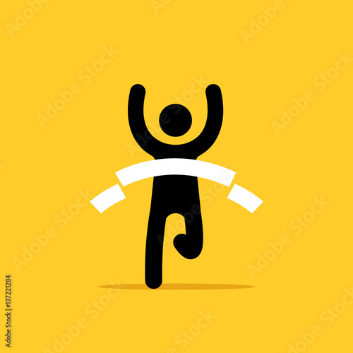 Man crosses a finish line.