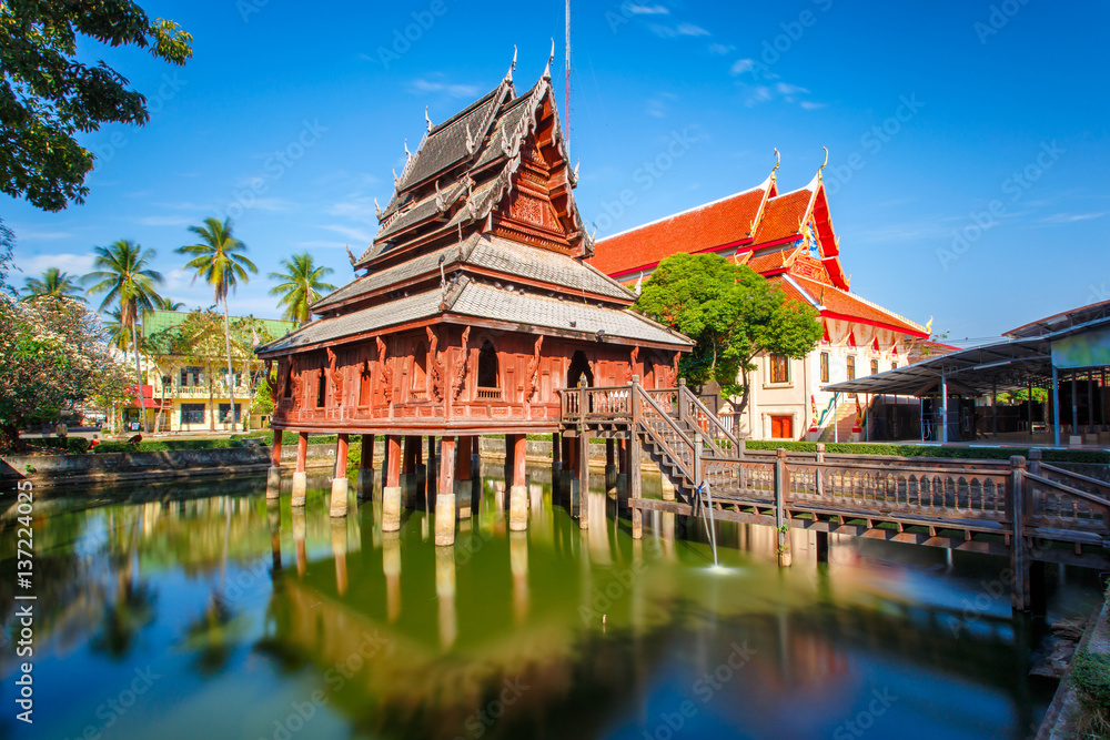 The library on stilts in Wat Thung Si Muang temple in Ubon Ratchatani in Isan, north eastern Thailand.