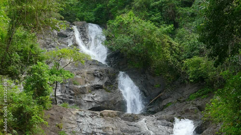 Khao Lampi waterfall in Hat Thai Mueang national park, Thailand, 4k
Khao Lampi waterfall in Hat Thai Mueang national park, Thailand, 4k