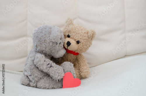 Teddy bears hugging