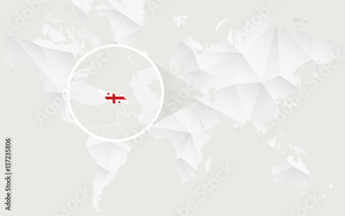 Georgia map with flag in contour on white polygonal World Map.