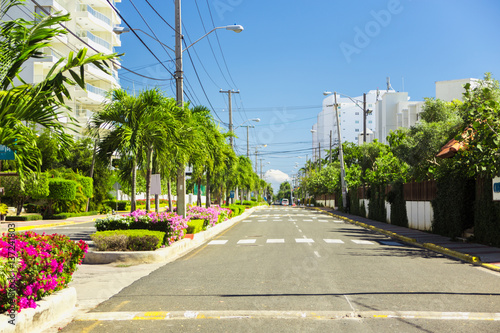 Bild auf Leinwand Bright street of Boca Chica, Dominican Republic