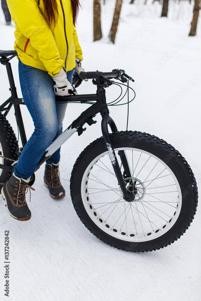 Girl in jeans on bicycle Girl in jeans on bicycle