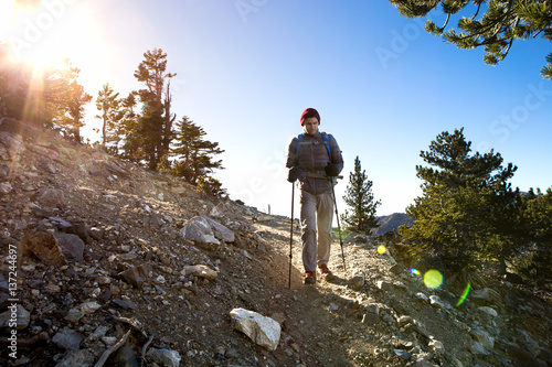 Hiker walking Cucamonga Peak, Mount Baldy, California, USA photo
