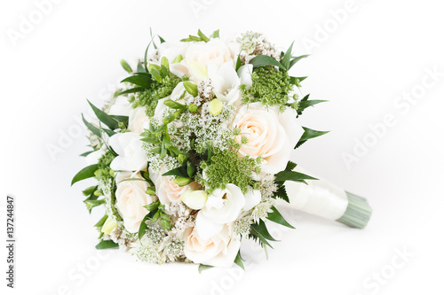 Ivory and green wedding bouquet of roses and freesia flowers photo
