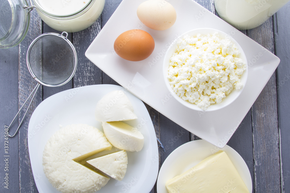 Dairy products curd cheese Milk Yogurt natural products wood background
Dairy products curd cheese Milk Yogurt natural products wood background