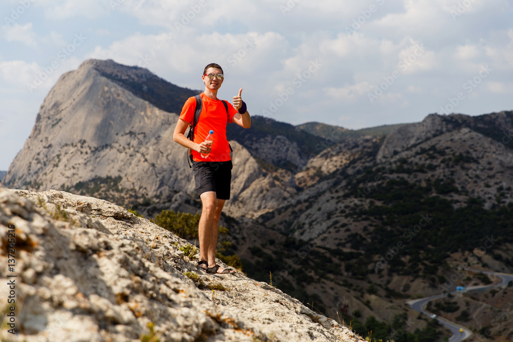 Man travels through mountains day Man travels through mountains day