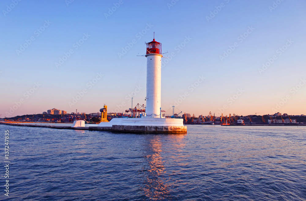 Operating lighthouse in Odessa in the evening. Ukraine. Black sea