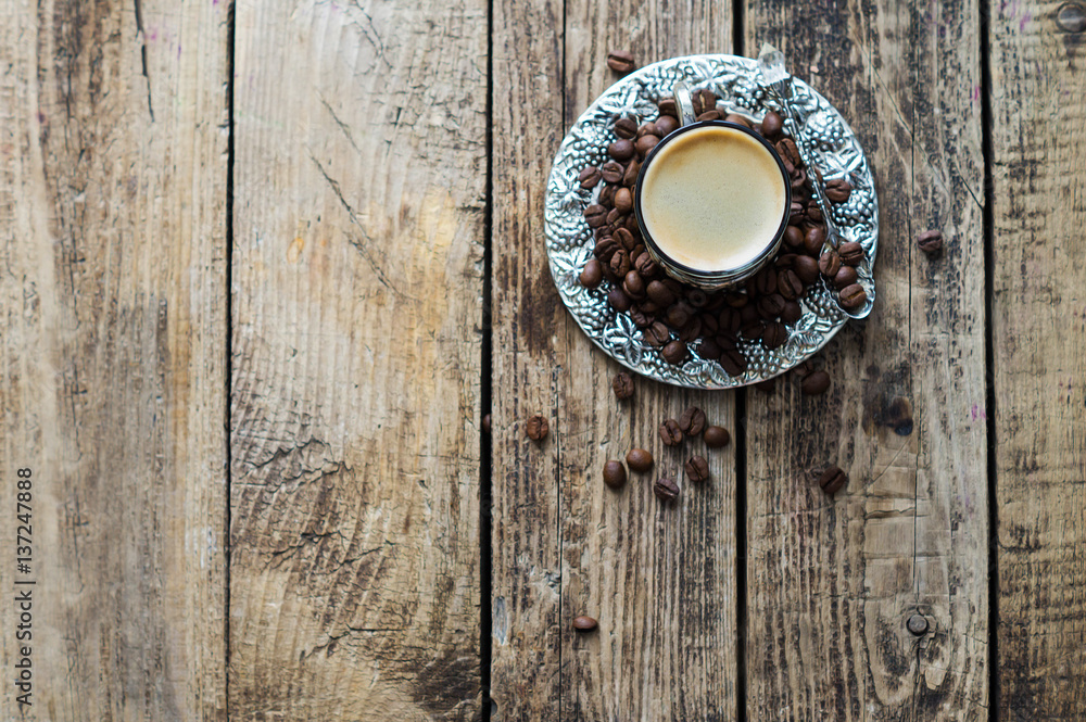A Cup of espresso on brown background A Cup of espresso on brown background