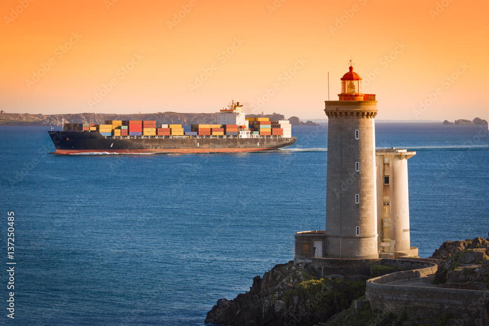 Phare du Petit Minou with container ship, Brittany, France