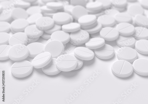 Pile of Round White Pills on White Background
