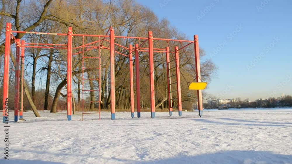 Empty swing in winter park Empty swing in winter park