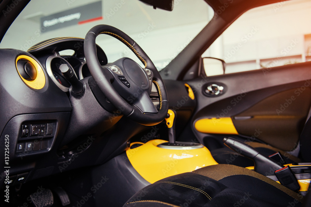 Modern car interior dashboard and steering wheel