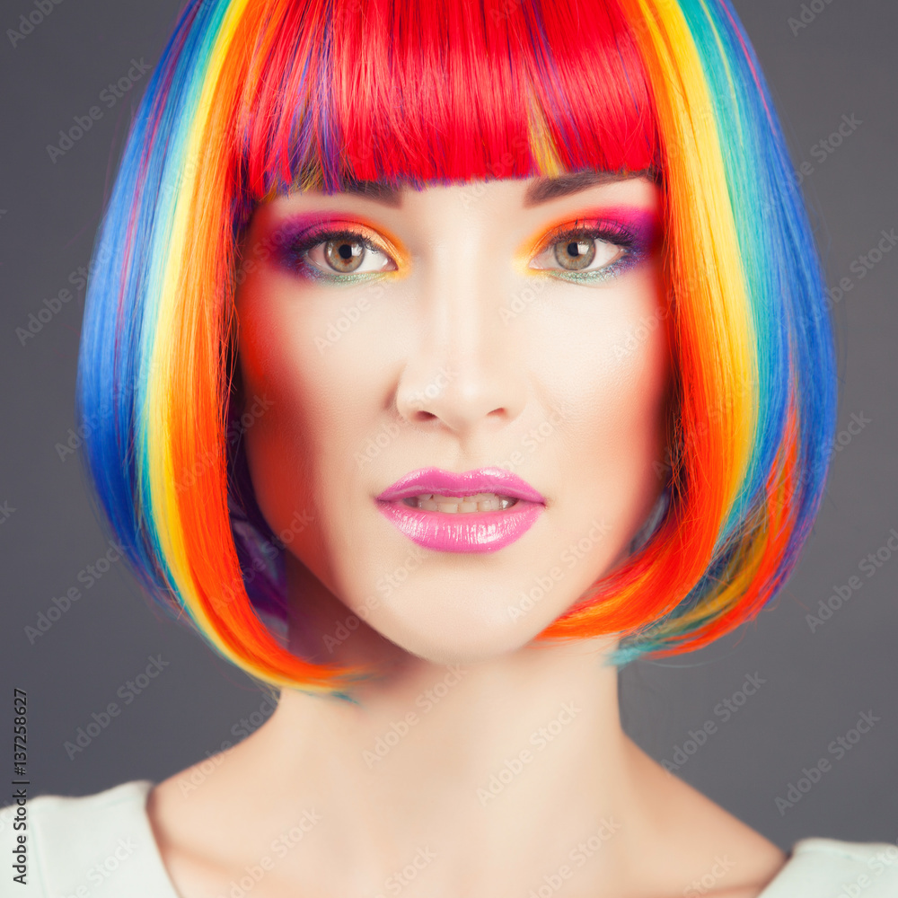 Fototapeta premium beautiful woman wearing colorful wig