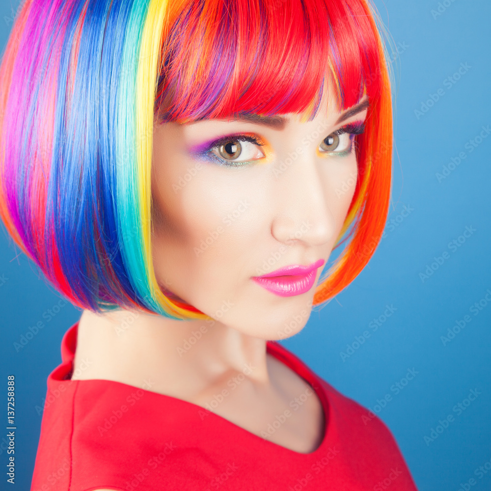 Fototapeta premium beautiful woman wearing colorful wig