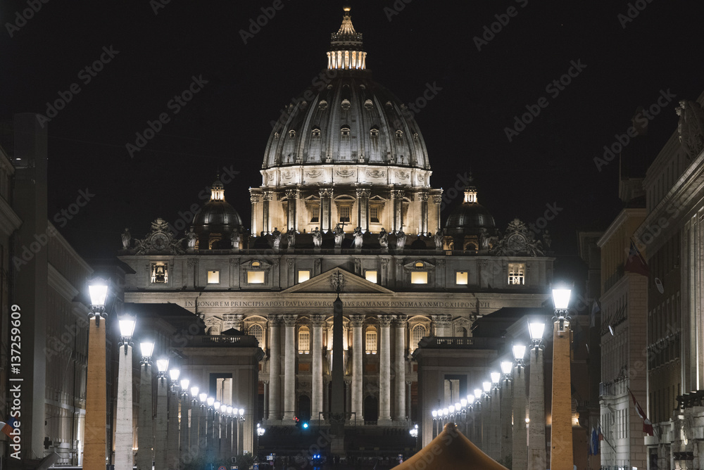 Night view at St. Peter's cathedral in Rome, Italy
