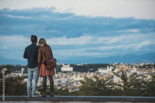 Couple looking through the city