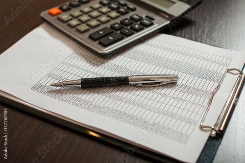 Slika na platnu Accounting documents, pens and calculator closeup