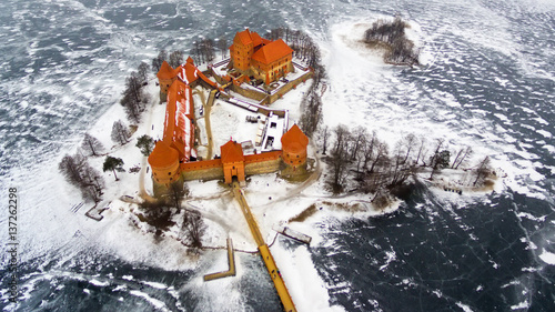 Trakai, Lithuania: aerial winter UAV top view, flat lay of gothic Island Castle. Historical residence in capital city of Grand Duchy of Lithuania, located in Galve lake
 photo