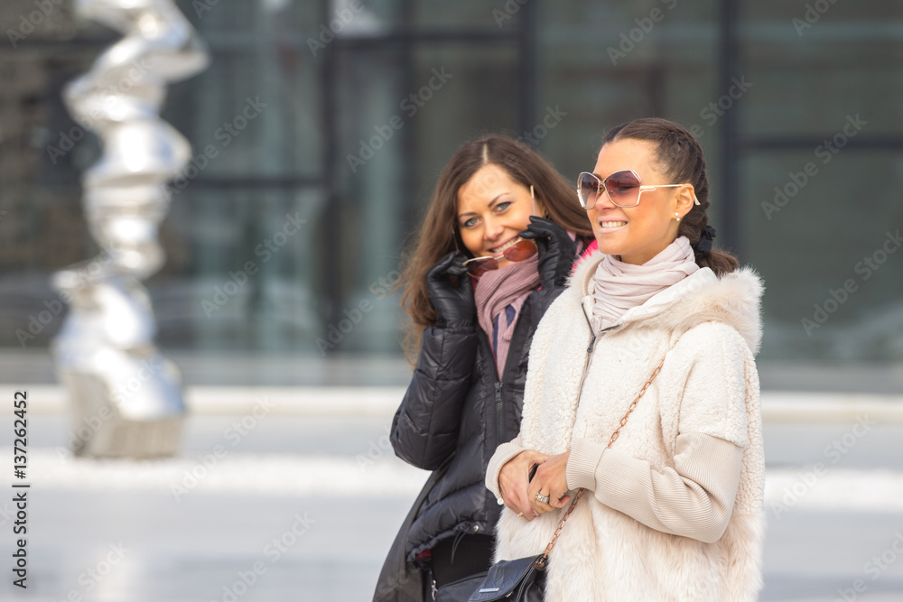Two Beautiful Women On urban background