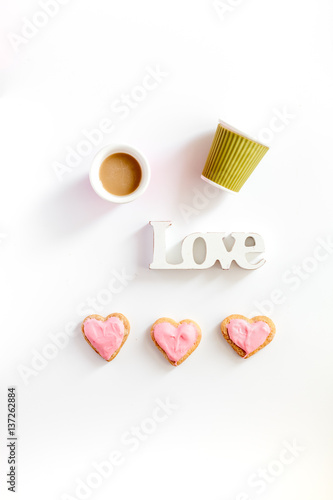 cookies for Valentine Day heartshaped white background top view pattern