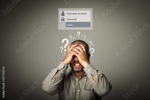 Frustrated. Forgot password concept. Question-marks