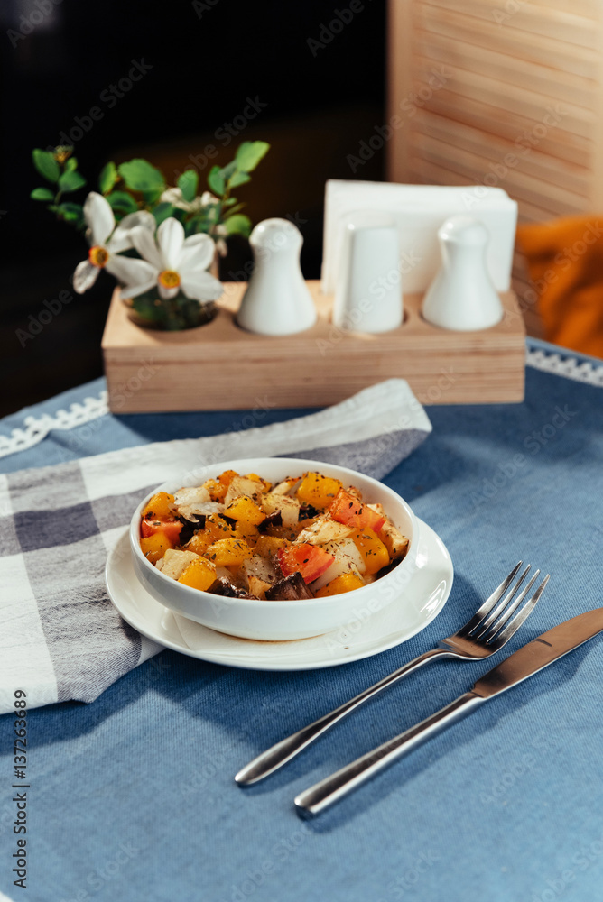 The cut fresh vegetables in a dish with spices The cut fresh vegetables in a dish with spices