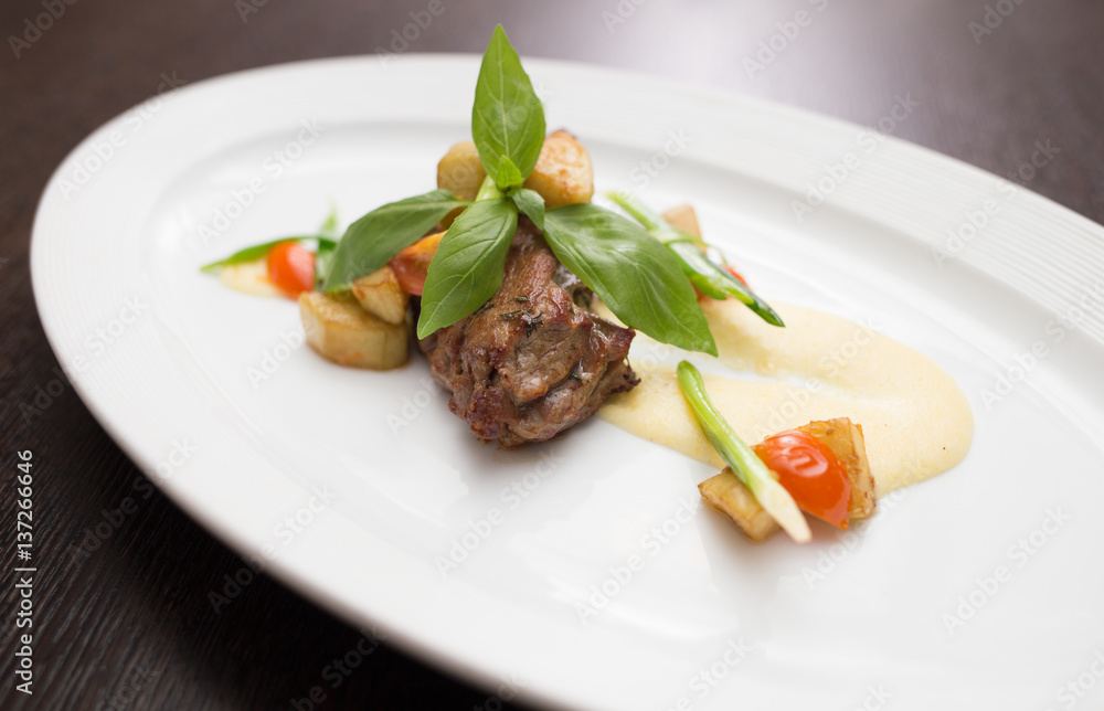 slices of duck with sauce and vegetables slices of duck with sauce and vegetables