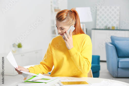 Angry woman speaking with b...