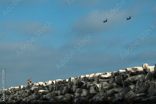 Chinook Helicopter fly over California jetty