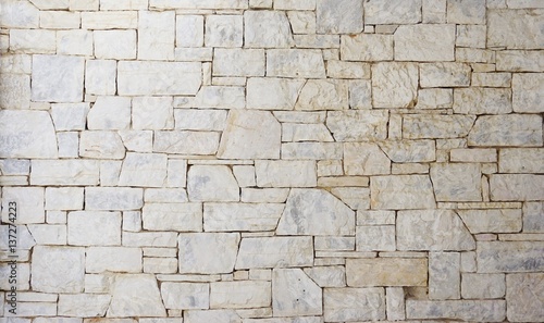 A white stone wall background