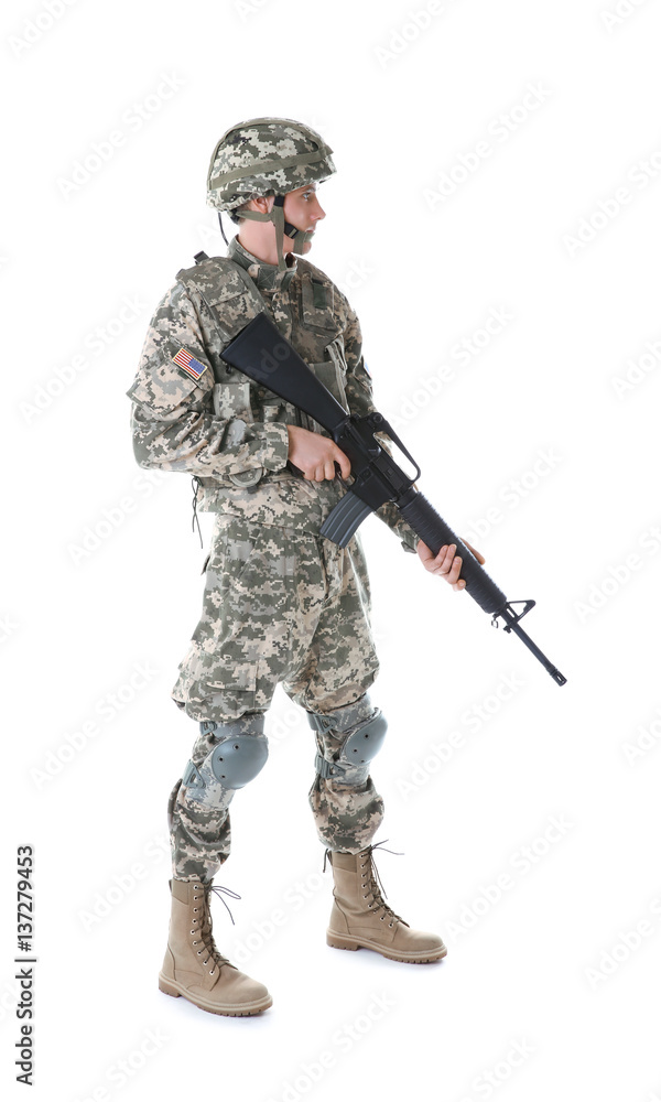 Soldier in camouflage holding rifle, isolated on white Soldier in camouflage holding rifle, isolated on white