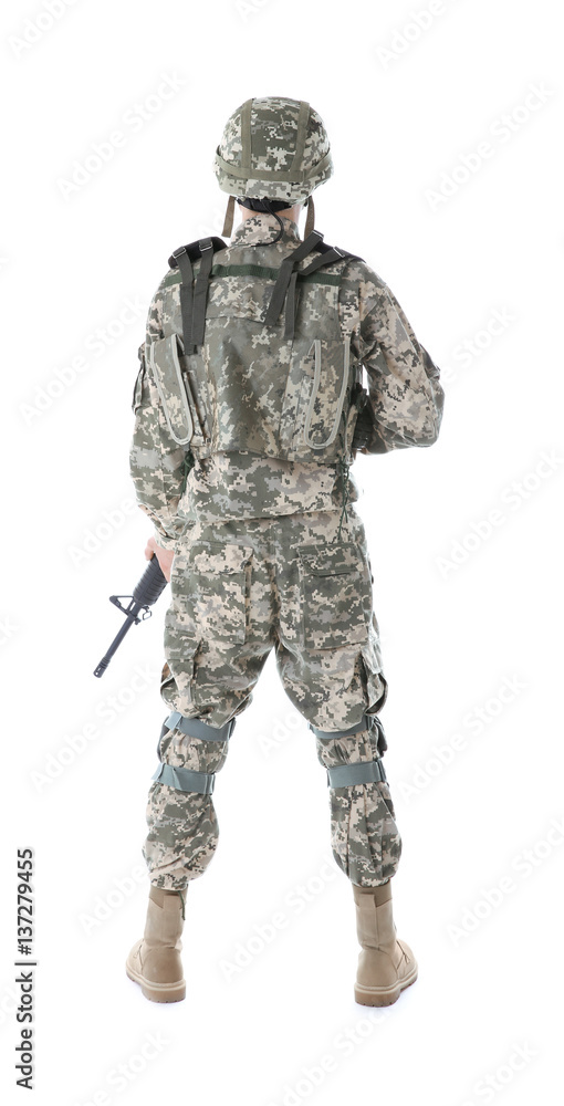 Soldier in camouflage holding rifle, isolated on white Soldier in camouflage holding rifle, isolated on white