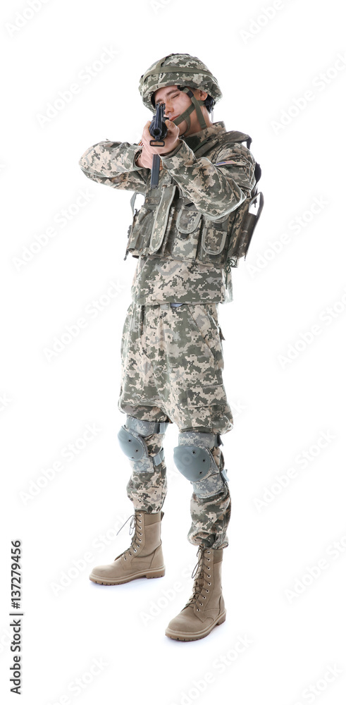 Soldier in camouflage taking aim, isolated on white Soldier in camouflage taking aim, isolated on white