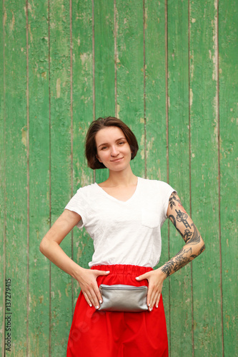 Stylish young woman with si...