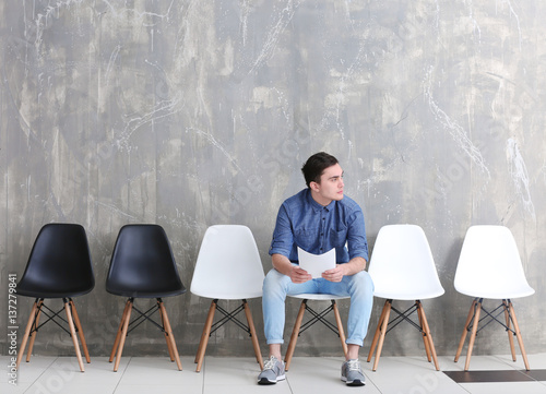 Young man waiting for job i...