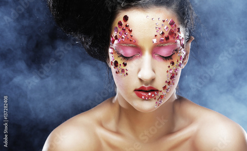 woman with bright artistic make-up photo