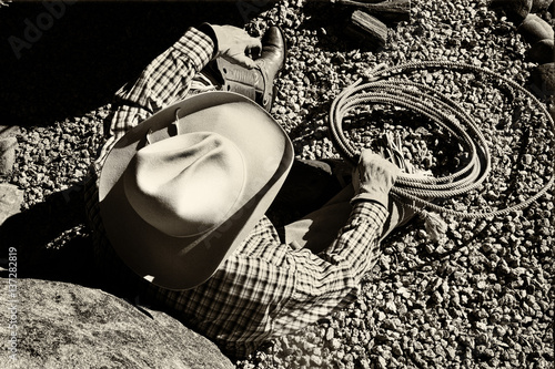 Cowboy Resting with Rope - Sepia 