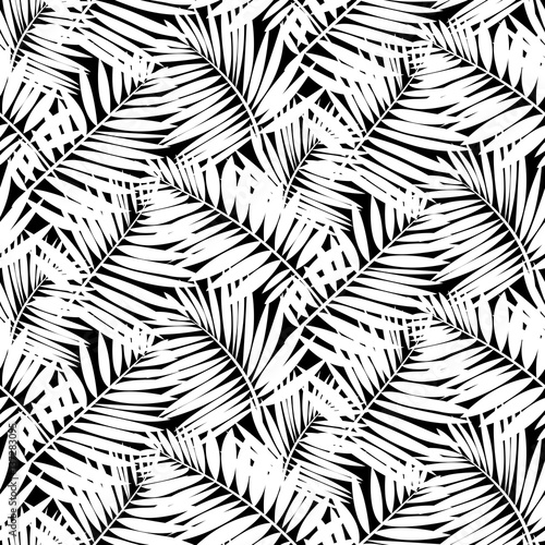 Seamless pattern with tropical palm leaves