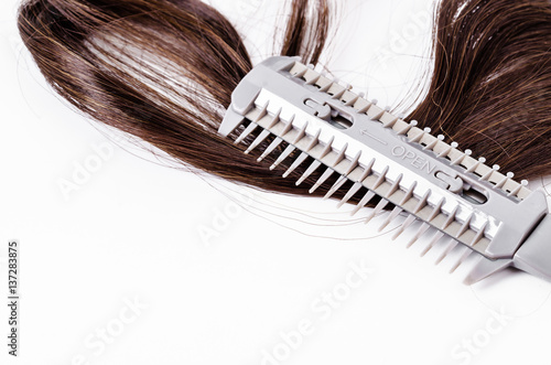 Comb slice hair with blade and hairs.